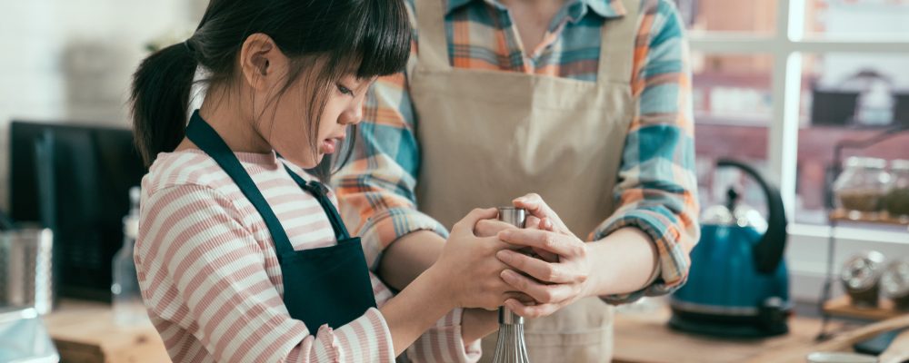 Asian,Japanese,Girl,And,Her,Beautiful,Mom,In,Aprons,Smiling